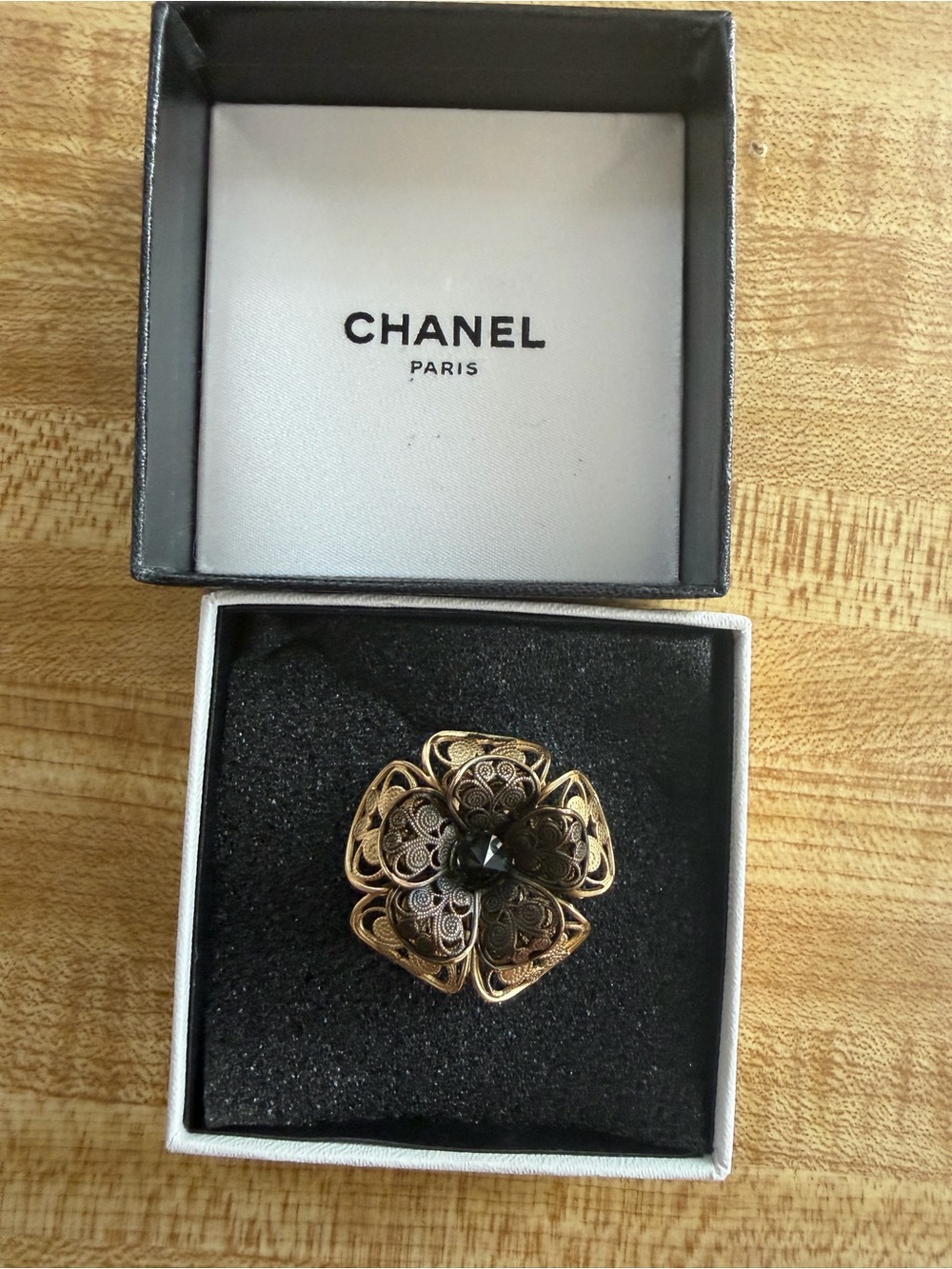 CHANEL Gold and Black Floral Camilia Filigree Ring. Size 6